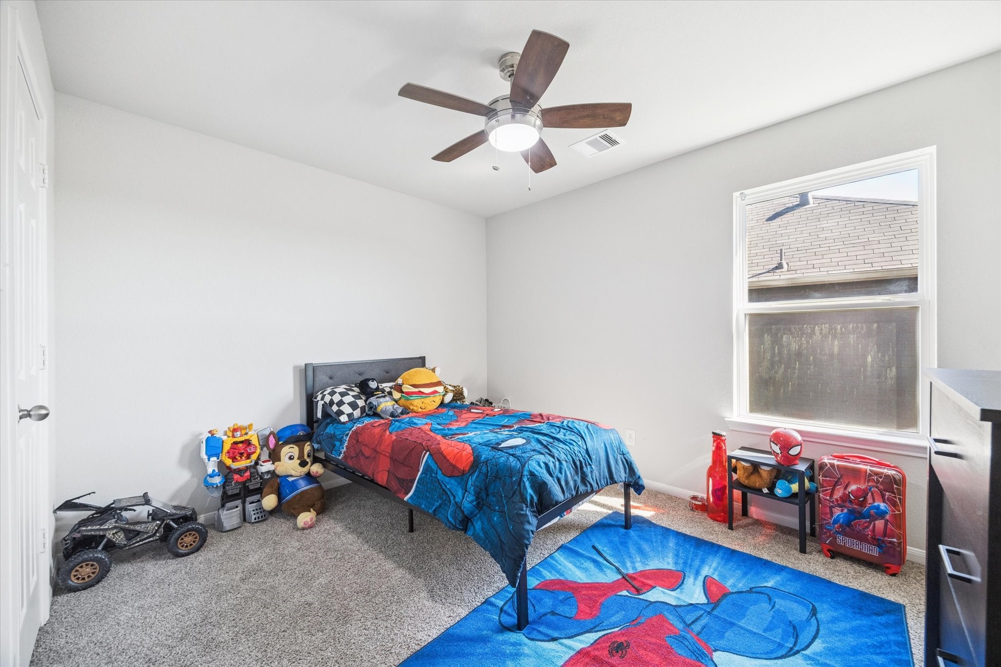 322 Upland Grv Trail Rosharon, TX 77583 - Photo 27 of 36 a bedroom with furniture and a wooden floor