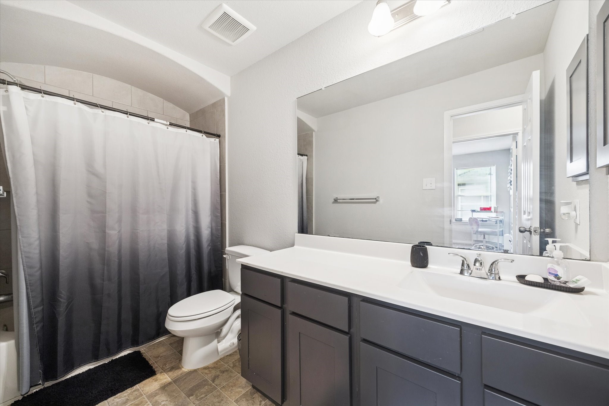 322 Upland Grv Trail Rosharon, TX 77583 - Photo 32 of 36 a bathroom with a sink a toilet and a mirror