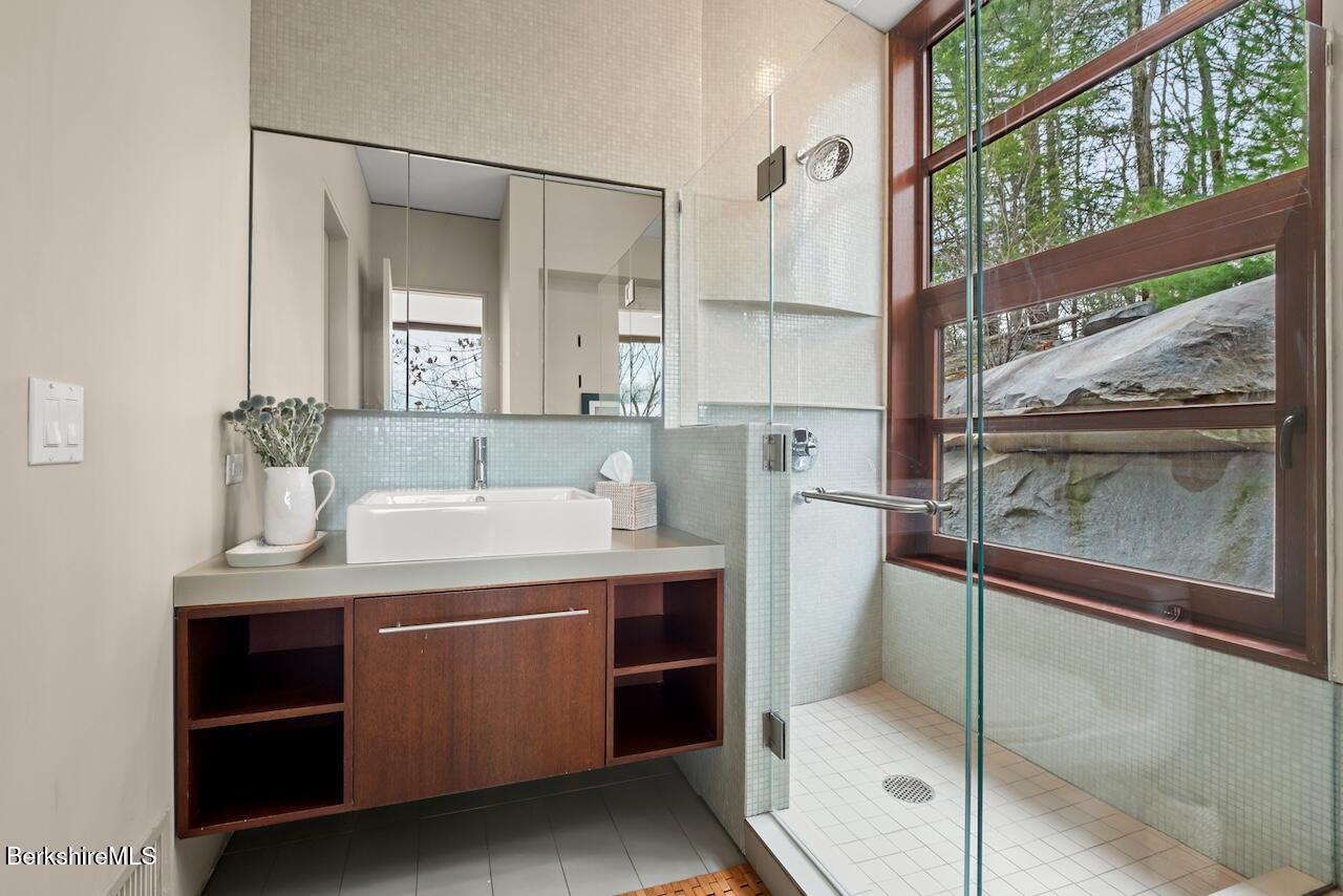 250 Long Pond Road Great Barrington, MA 01230 - Photo 50 of 56 a room with a washing machine and dryer