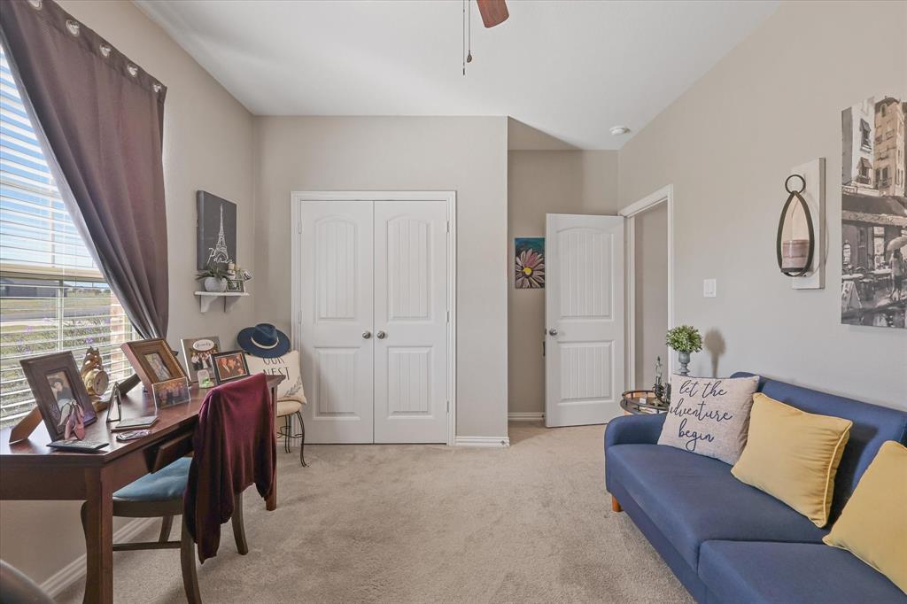 2375 County Road 4010 Decatur, TX 76234 - Photo 12 of 34 Office area featuring light colored carpet and a ceiling fan