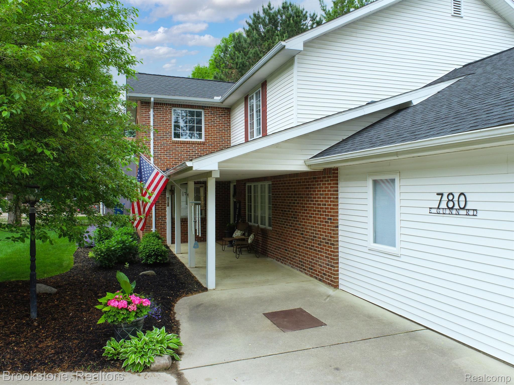 780 East Gunn Road Rochester, MI 48306 - Photo 5 of 56 Welcoming front porch invites you in