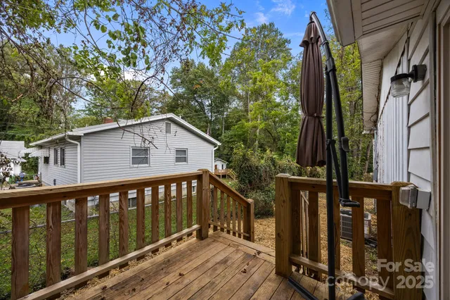 a view of a wooden house with a large window