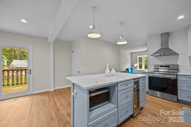 a kitchen with a stove and a sink
