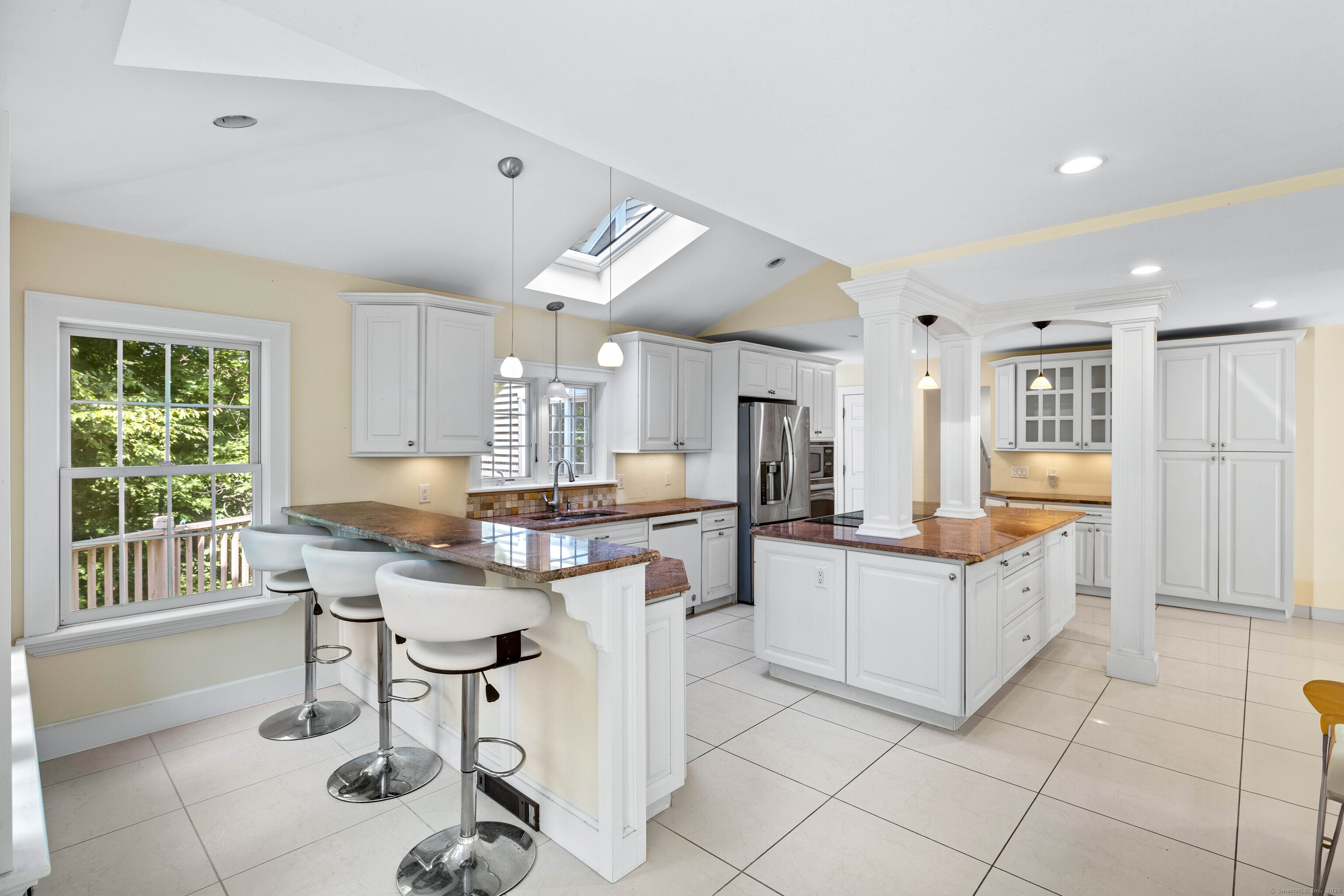 332 Lantern Hill Road Stonington, CT 06355 - Photo 12 of 38 a kitchen with a sink a counter top space and appliances
