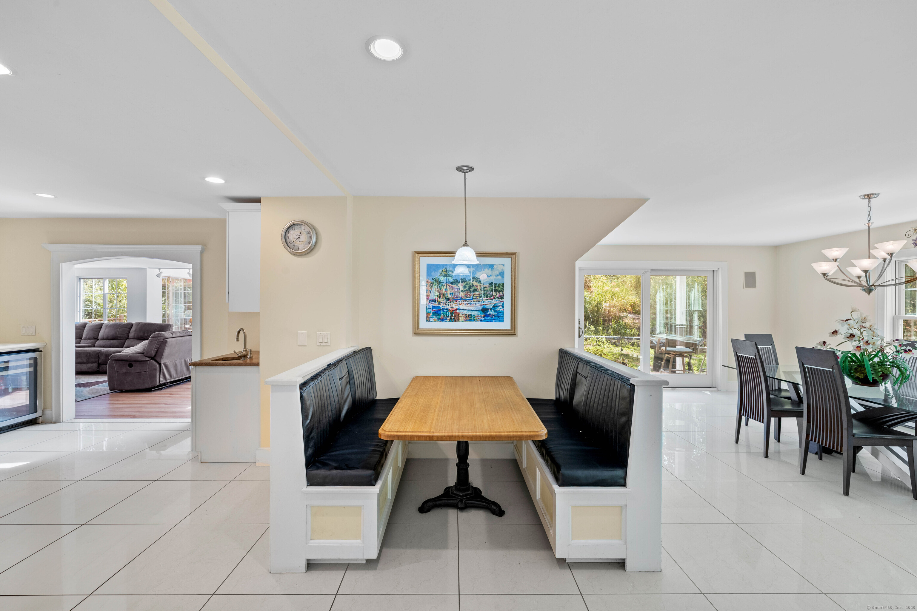332 Lantern Hill Road Stonington, CT 06355 - Photo 15 of 38 a dining room with furniture and a window