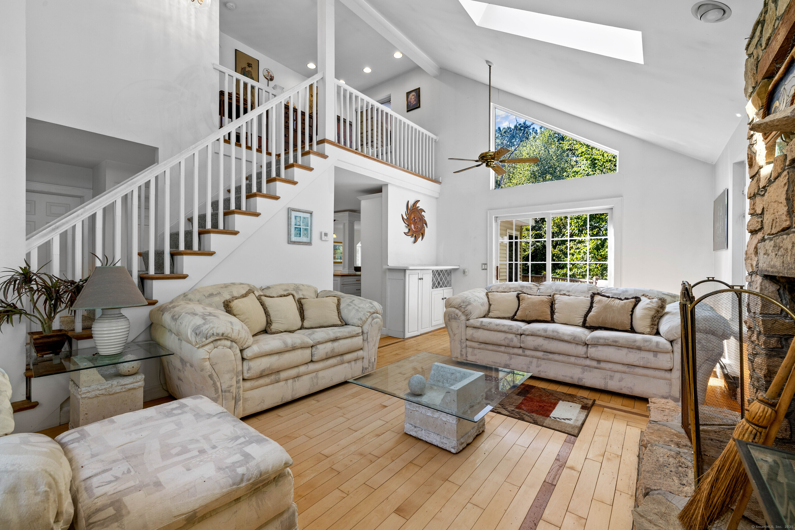 332 Lantern Hill Road Stonington, CT 06355 - Photo 20 of 38 a living room with furniture and a large window