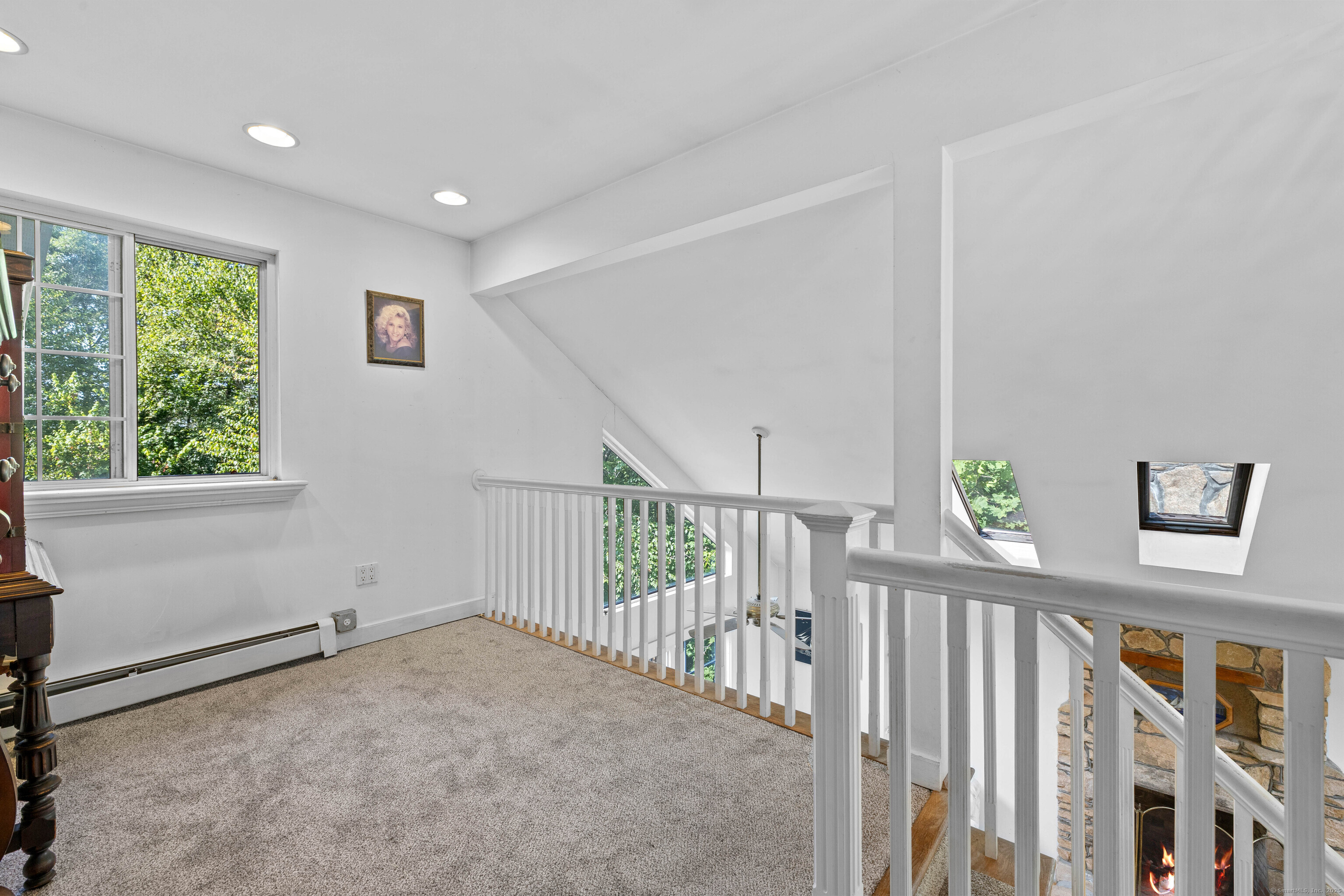 332 Lantern Hill Road Stonington, CT 06355 - Photo 23 of 38 a view of an empty room with a window