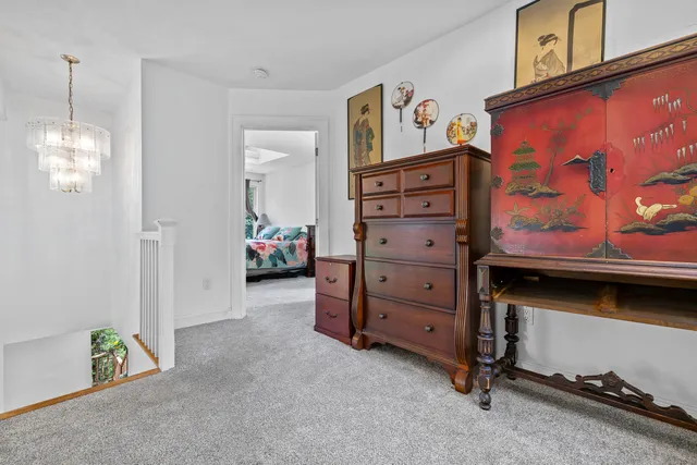 a view of a livingroom with furniture and toys