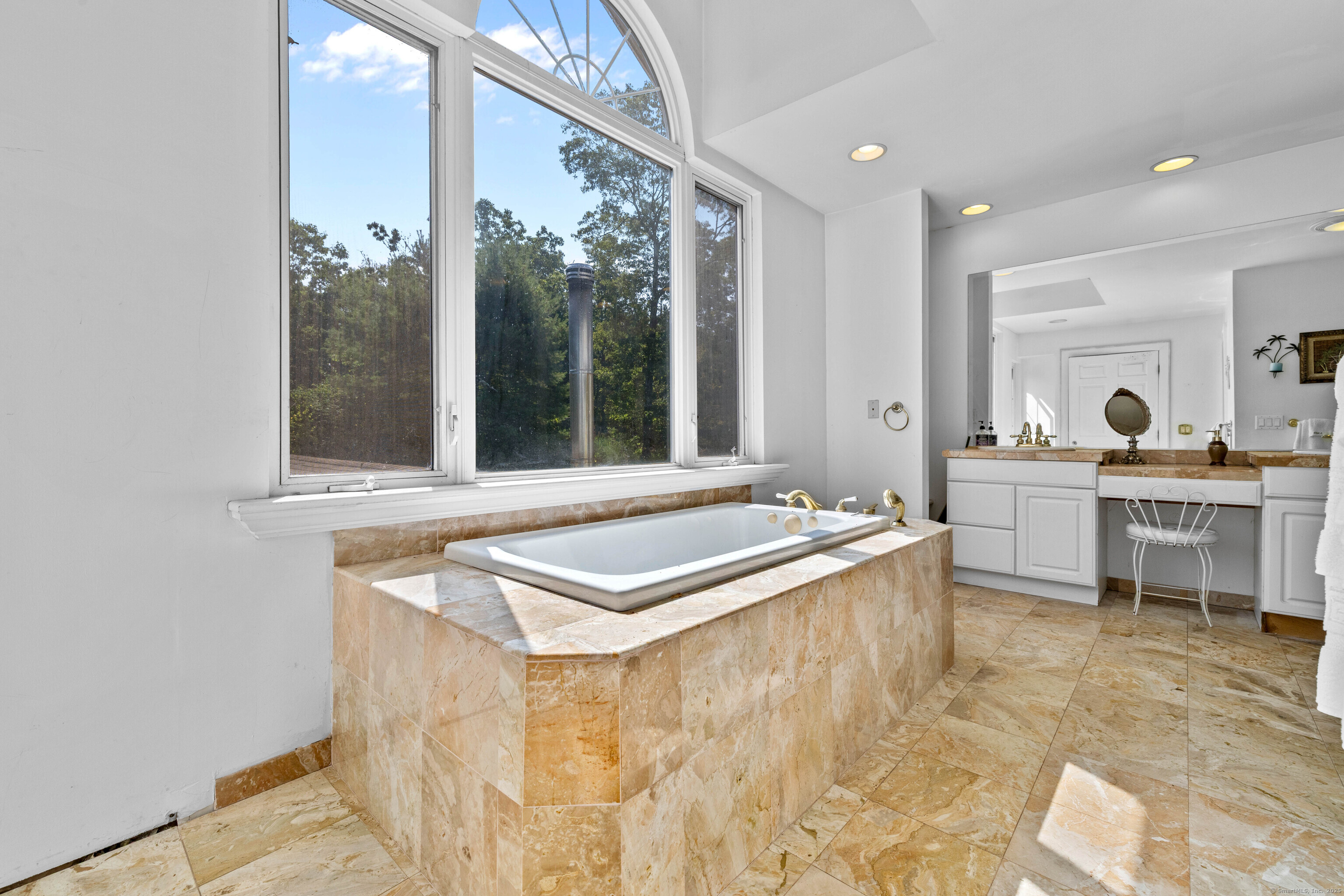 332 Lantern Hill Road Stonington, CT 06355 - Photo 28 of 38 a room with table chairs and large window