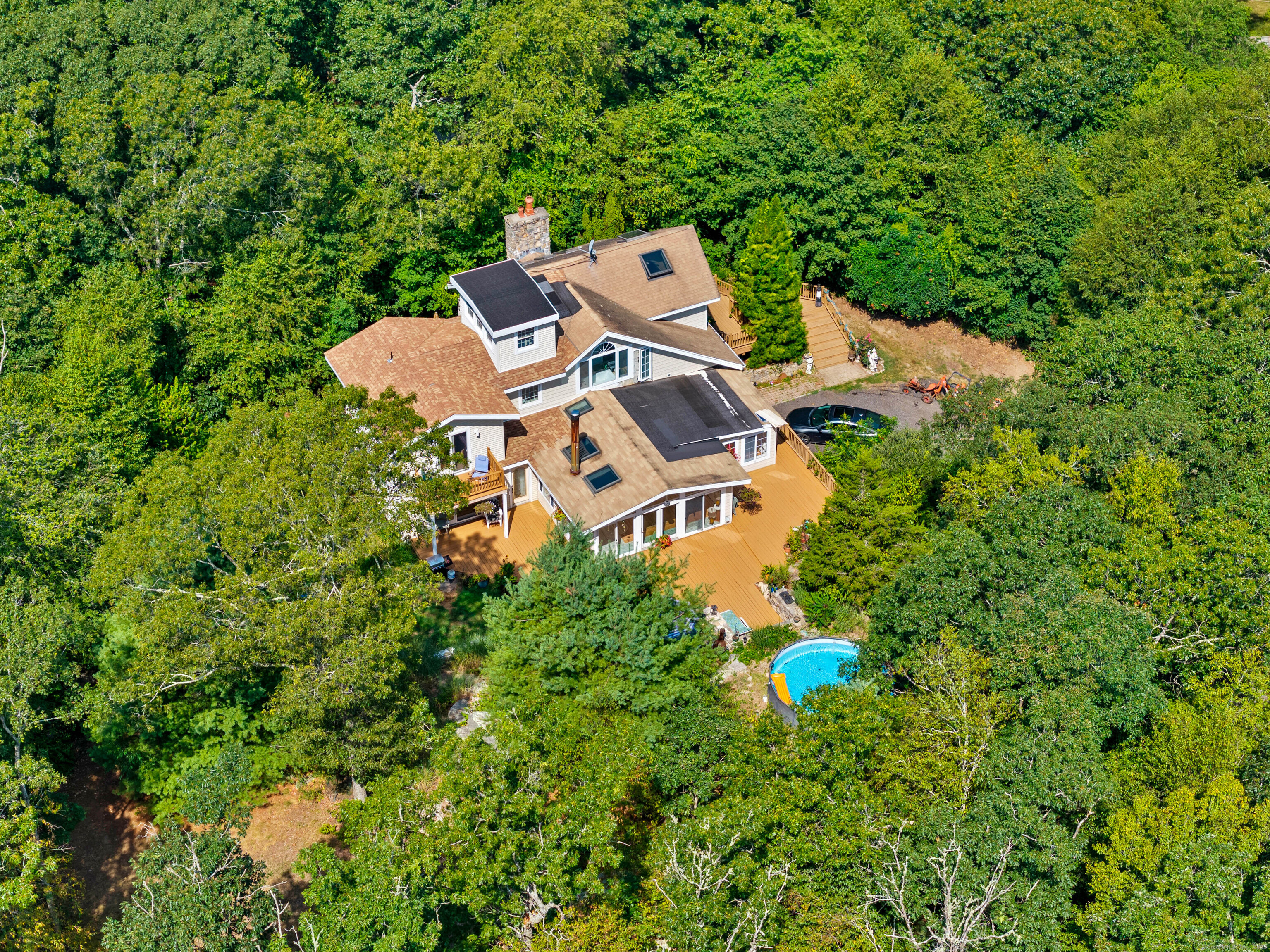 332 Lantern Hill Road Stonington, CT 06355 - Photo 38 of 38 an aerial view of a house with a yard