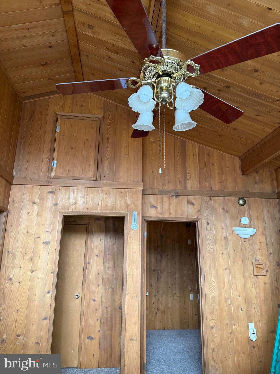 27 Hummingbird Heights Franklin, WV 26807 - Photo 7 of 12 a view of a hallway with a chandelier