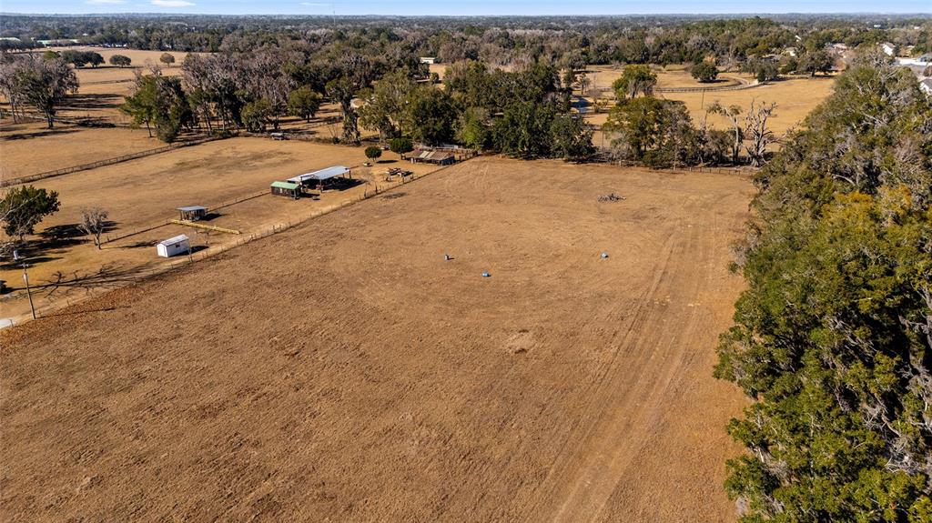 4101 Southeast 110th Street Belleview, FL 34420 - Photo 15 of 20 an aerial view of residential houses with outdoor space