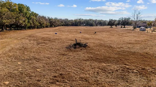 a view of outdoor space and yard