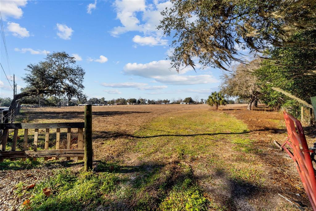 4101 Southeast 110th Street Belleview, FL 34420 - Photo 5 of 20 a view of a lake with houses in the back