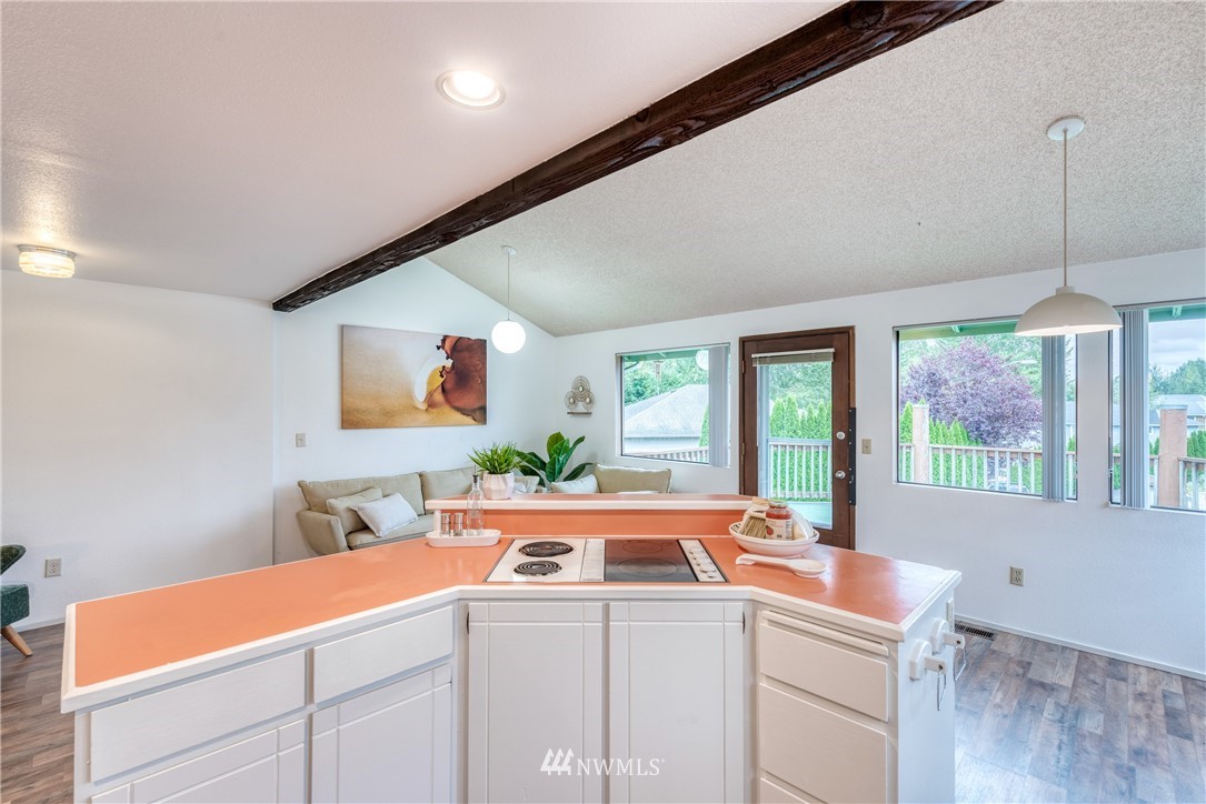 12216 Southeast 258 Place Kent, WA 98030 - Photo 21 of 40 a room with furniture and window