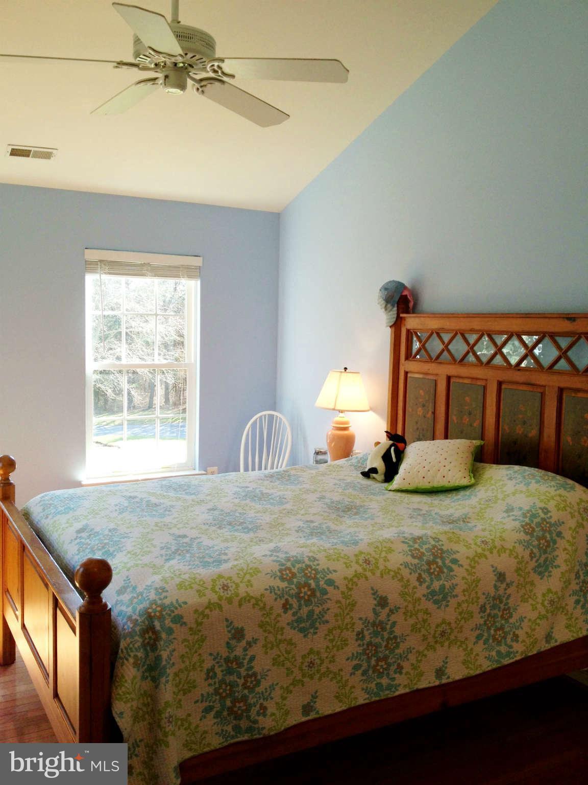 24904 Frederick Road Clarksburg, MD 20871 - Photo 25 of 30 a bedroom with a bed and window