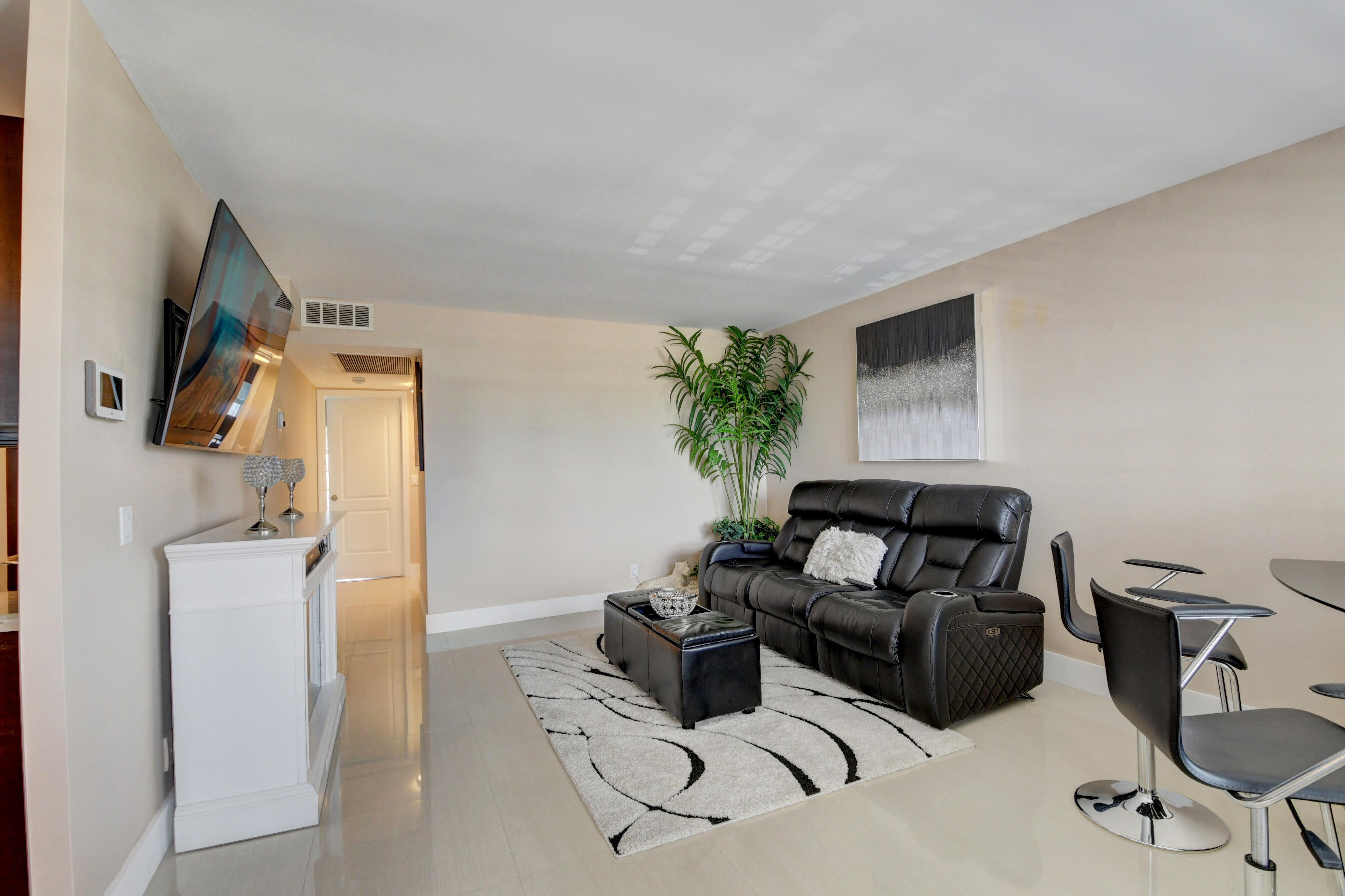 3063 Exeter, Unit 3063 Boca Raton, FL 33434 - Photo 11 of 57 Living room views towards bedrooms
