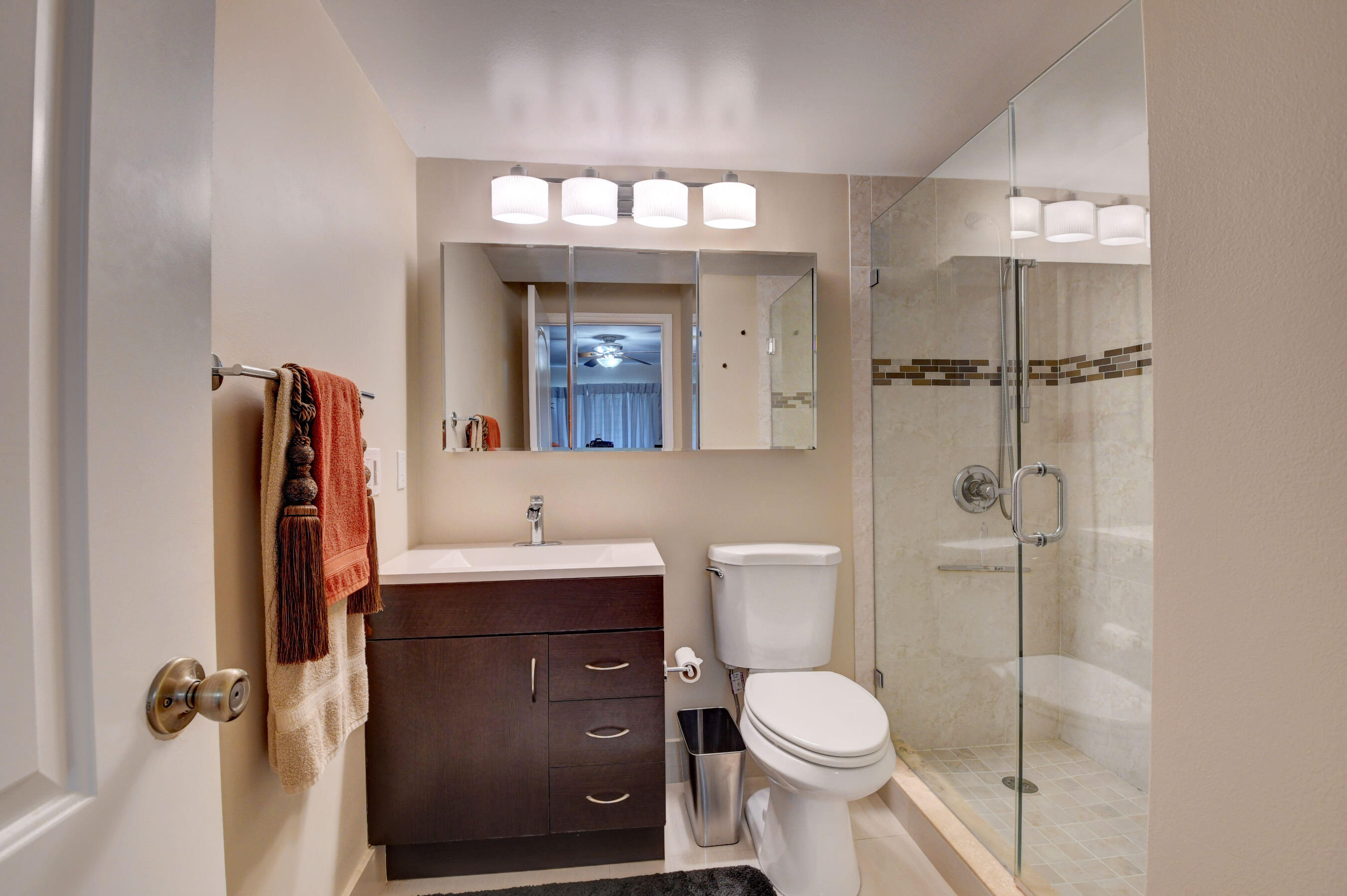 3063 Exeter, Unit 3063 Boca Raton, FL 33434 - Photo 15 of 57 Remodeled bath frameless shower