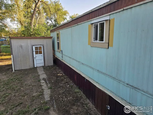 a house view with a backyard space