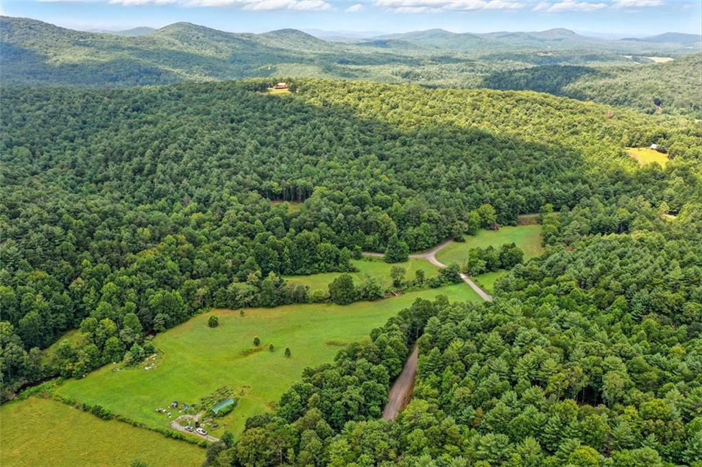0 Old Bucktown Road Ellijay, GA 30536 - Photo 18 of 26 a view of a lush green hillside and houses