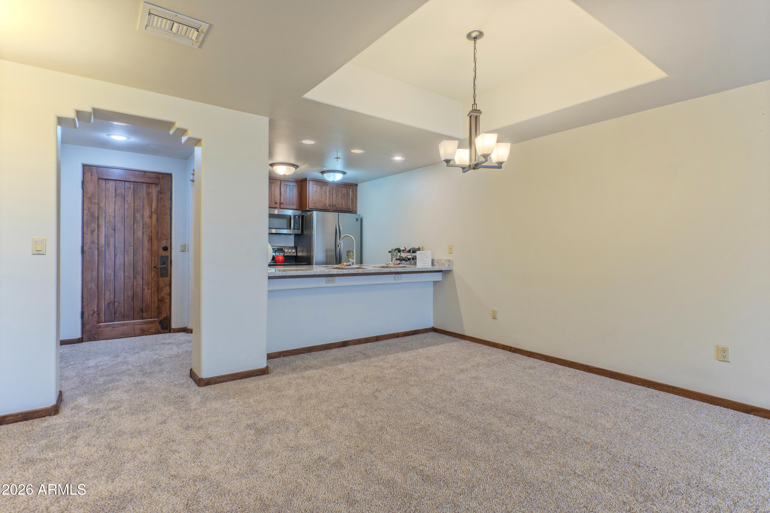 36601 North Mule Train Road, Unit B21 Carefree, AZ 85377 - Photo 10 of 33 Open kitchen and dining