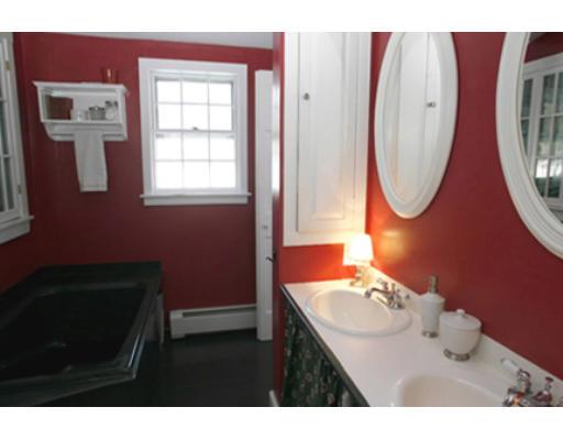 127 Whitman Road Groton, MA 01450 - Photo 10 of 22 a bathroom with a sink vanity mirror and toilet