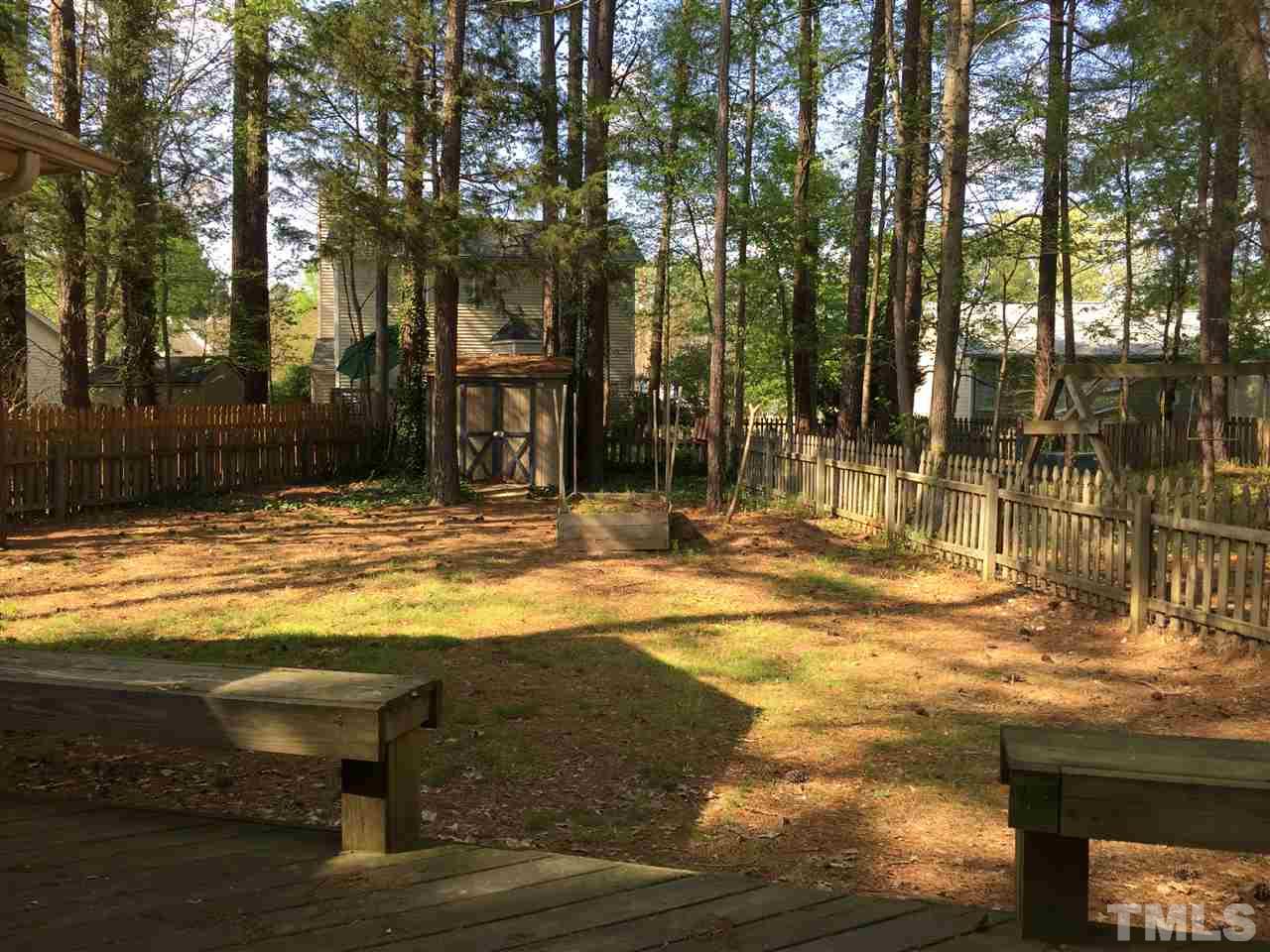 4114 Olde Coach Road Durham, NC 27707 - Photo 16 of 16 a view of a house with a yard