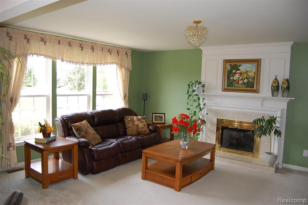 378 Pleasant Ridge Drive Canton, MI 48188 - Photo 2 of 25 Great room with fireplace