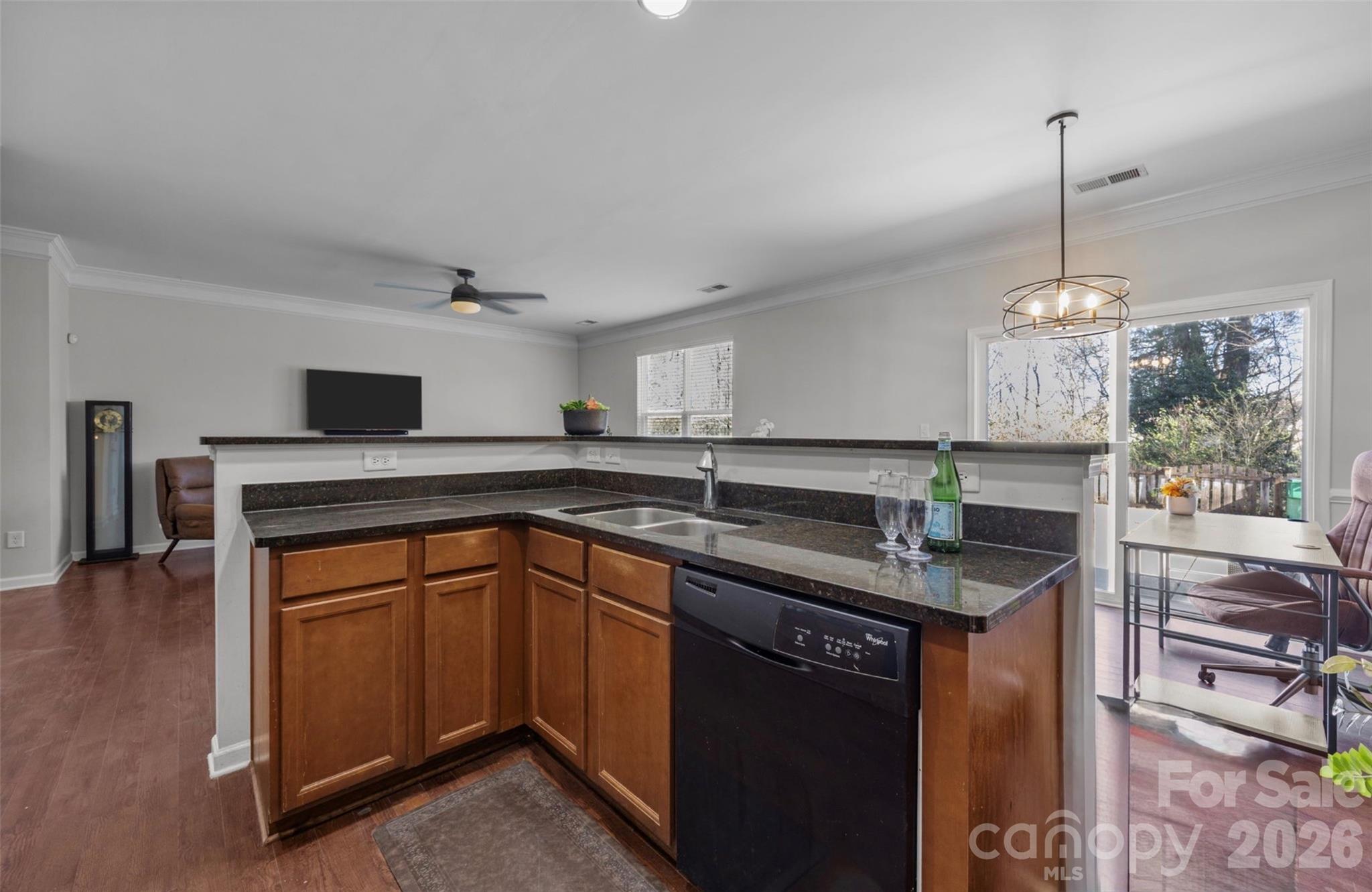 2707 Hunters Moon Lane Matthews, NC 28105 - Photo 8 of 27 a kitchen with a sink cabinets and window