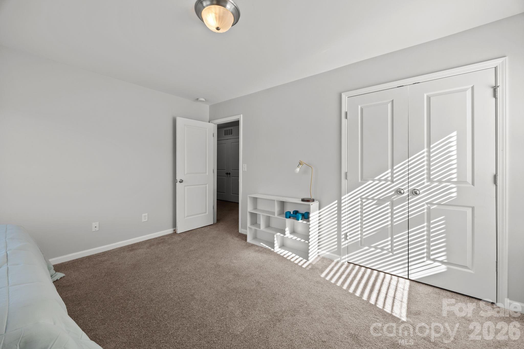 2707 Hunters Moon Lane Matthews, NC 28105 - Photo 10 of 27 a view of an empty room with stairs
