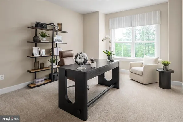 a living room with furniture and window