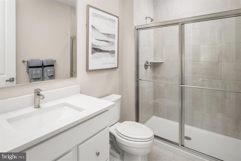 9421 Founders Lane Perry Hall, MD 21128 - Photo 26 of 27 a bathroom with a sink toilet and shower