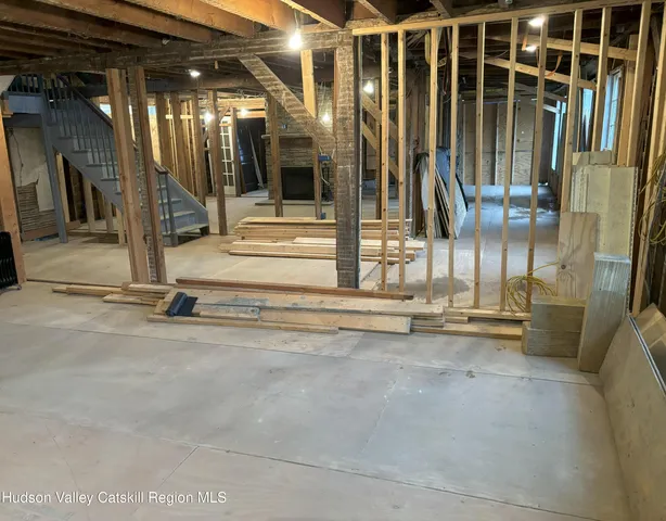 a view of a garage with wooden floor