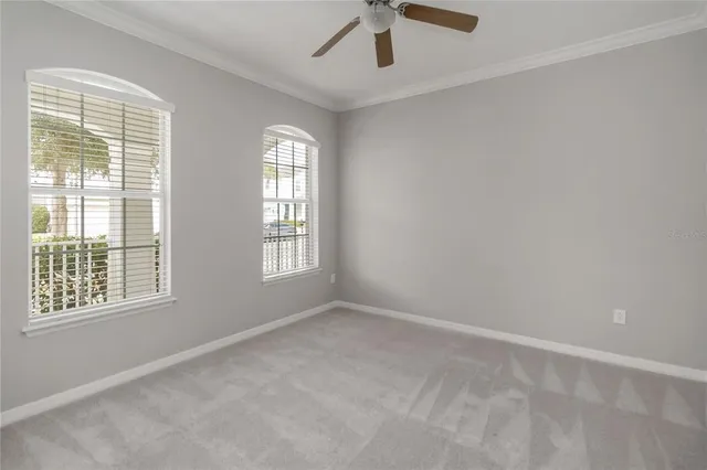 a view of an house with garden space and sitting area