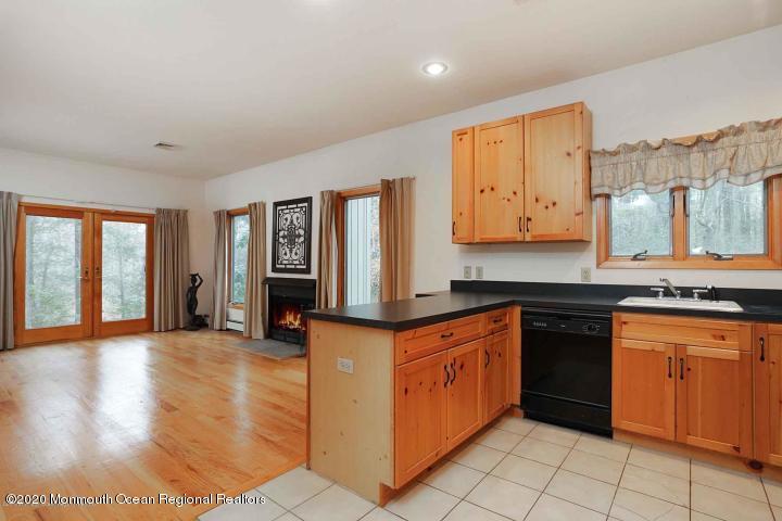 41 Muhlenbrink Road Colts Neck, NJ 07722 - Photo 4 of 72 kitchen to fireplace