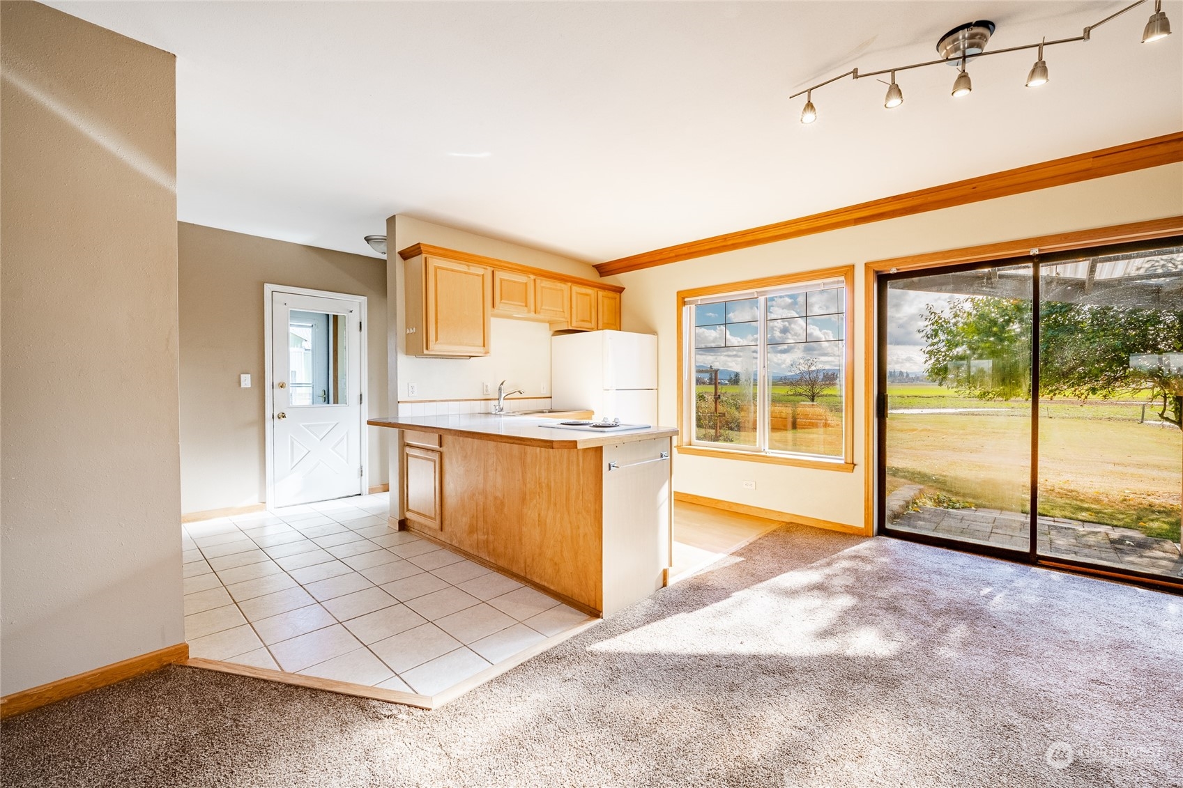 1243 Abbot Road Lynden, WA 98264 - Photo 20 of 40 a spacious bathroom with a granite countertop sink and a mirror