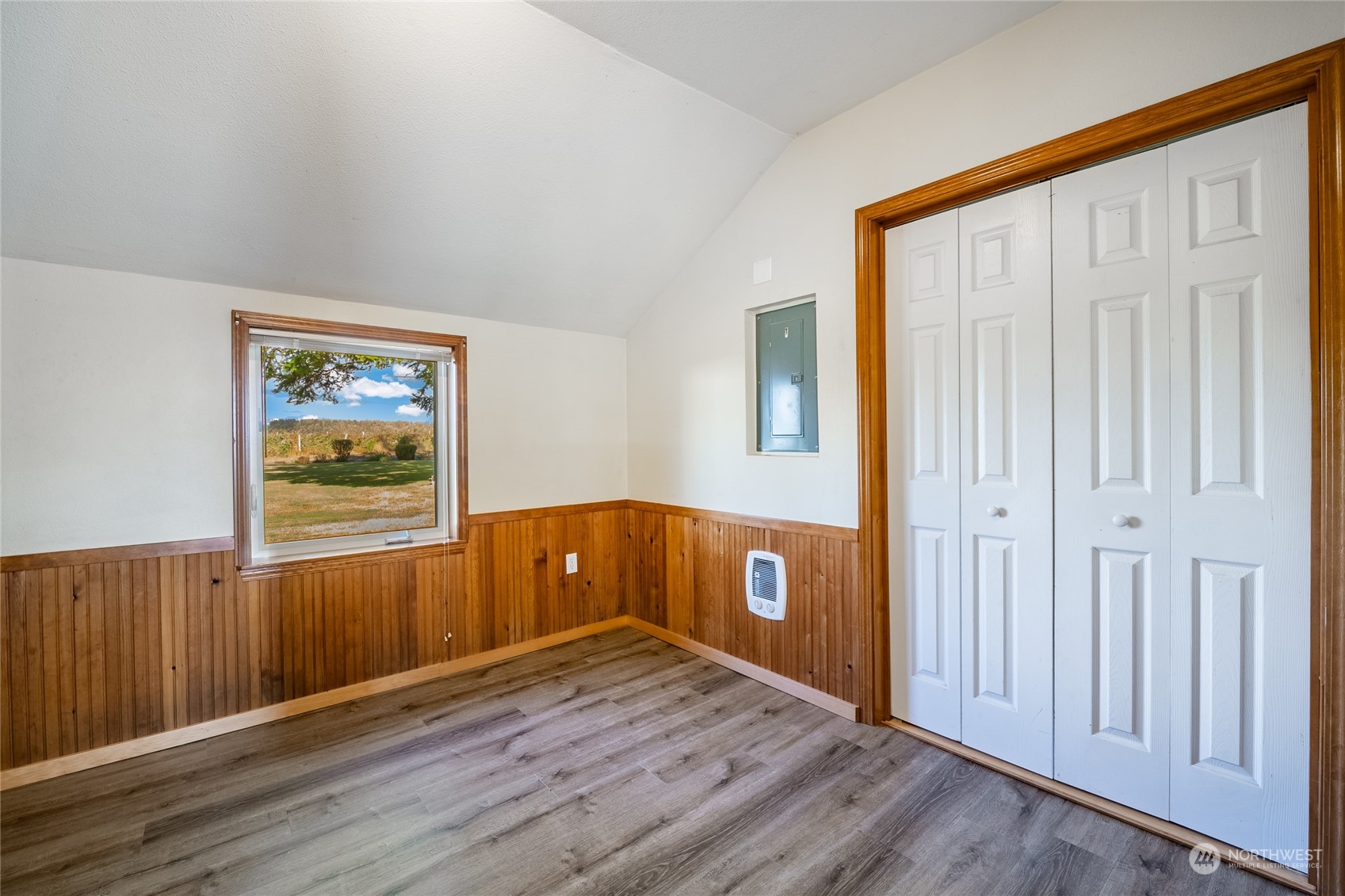 1243 Abbot Road Lynden, WA 98264 - Photo 21 of 40 an empty room with wooden floor and windows