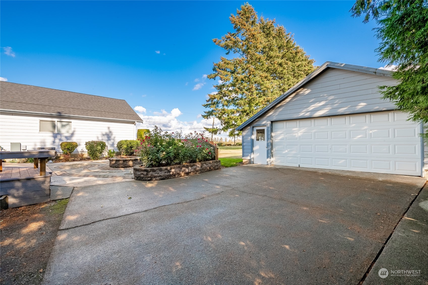 1243 Abbot Road Lynden, WA 98264 - Photo 24 of 40 a view of a house with a outdoor space and porch
