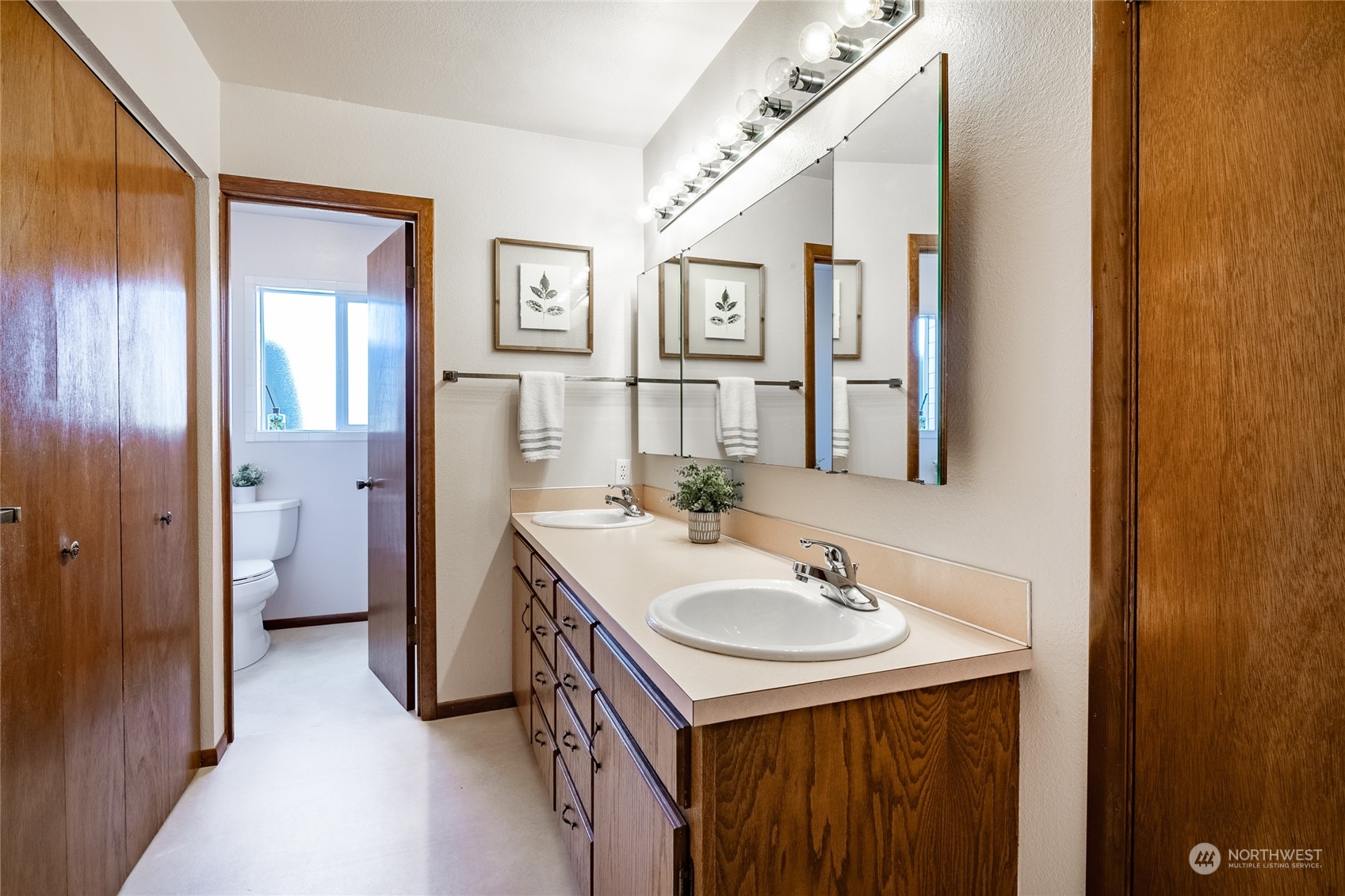 1243 Abbot Road Lynden, WA 98264 - Photo 32 of 40 a bathroom with a sink and a mirror