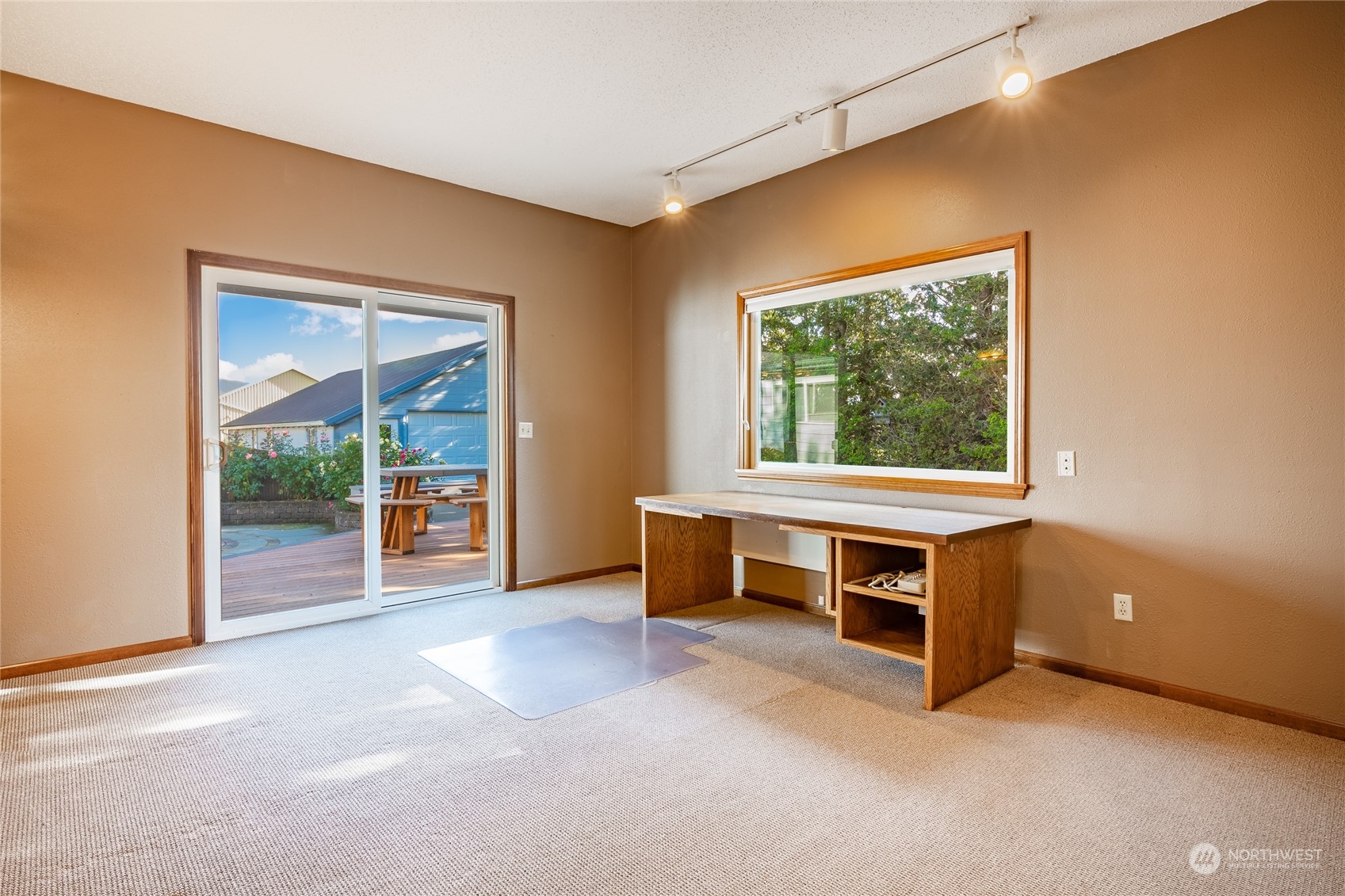 1243 Abbot Road Lynden, WA 98264 - Photo 37 of 40 an empty room with furniture and a window
