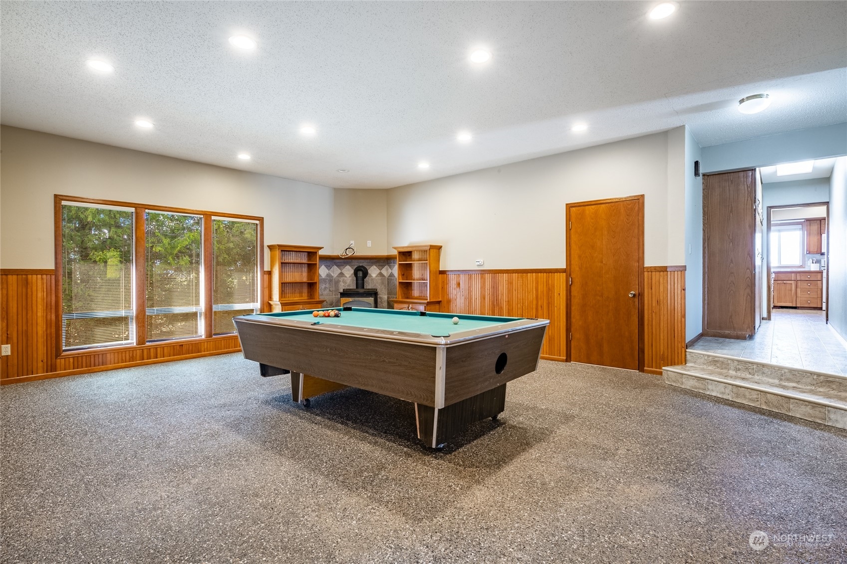 1243 Abbot Road Lynden, WA 98264 - Photo 38 of 40 a room with pool table and glass door