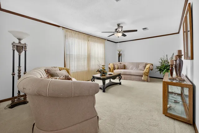a bathroom with a toilet and a mirror