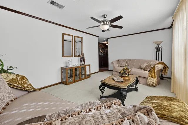 a bathroom with a toilet and a mirror