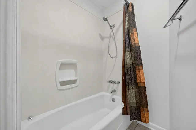 a view of house with swimming pool outdoor seating