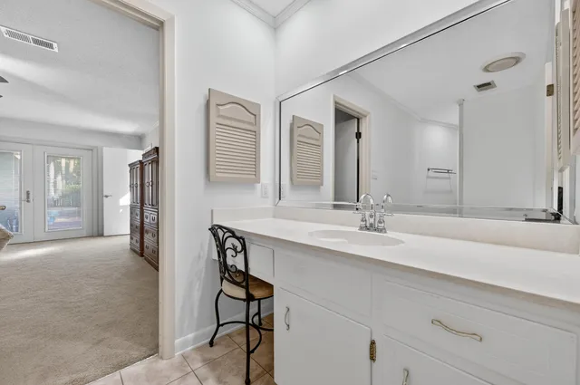 a view of a chairs and table in the patio