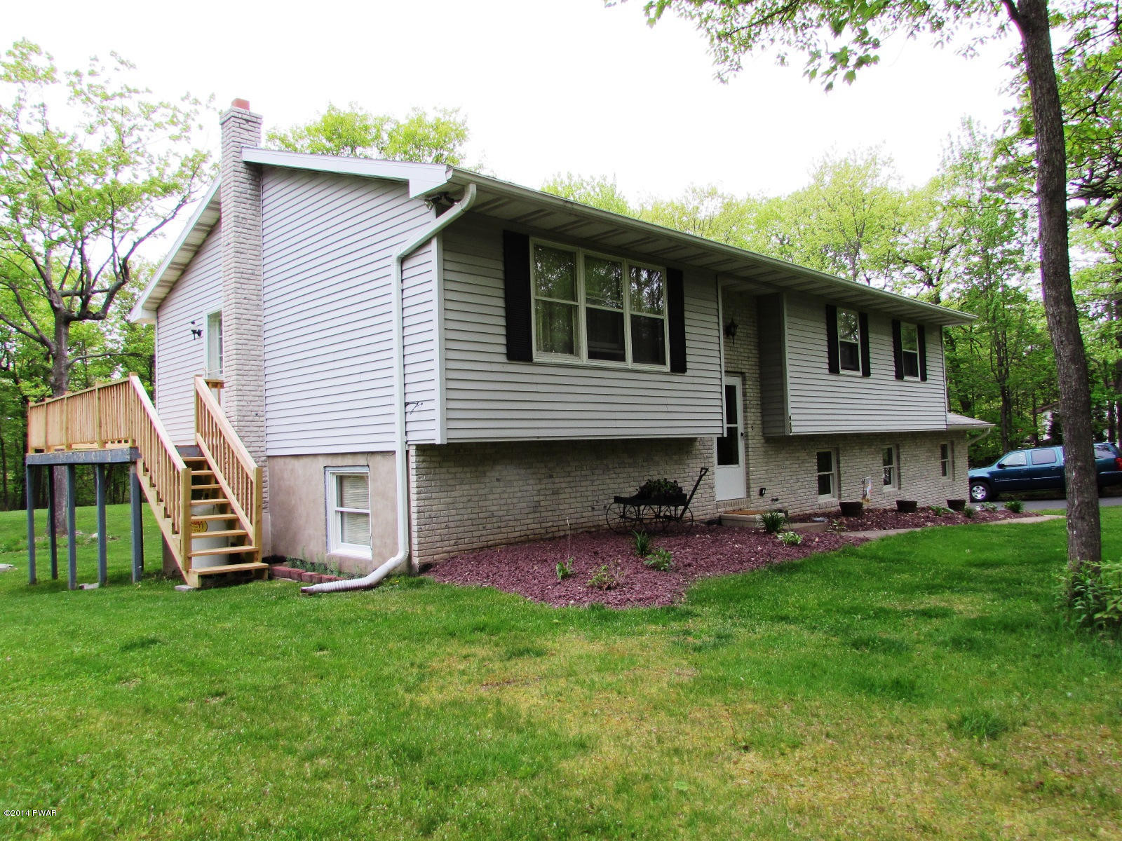 970 Forest Road Lake Ariel, PA 18436 - Photo 1 of 22 a view of a house with backyard
