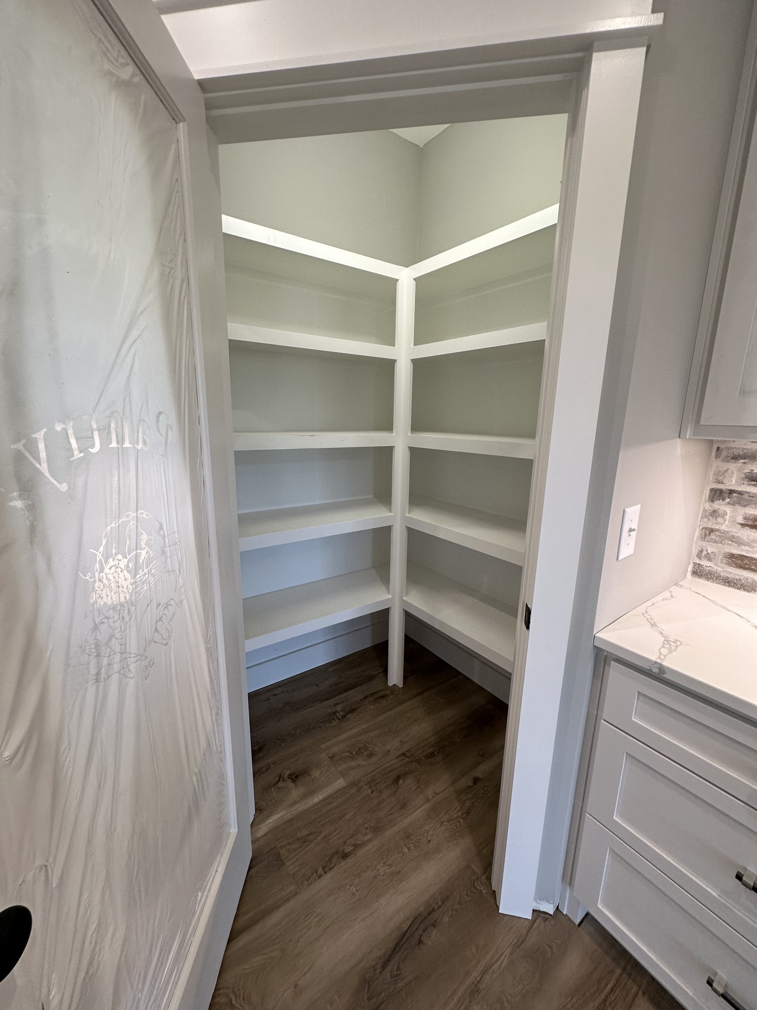 285 Aplin Branch Road Cottontown, TN 37048 - Photo 17 of 70 a view of walk in closet with empty racks
