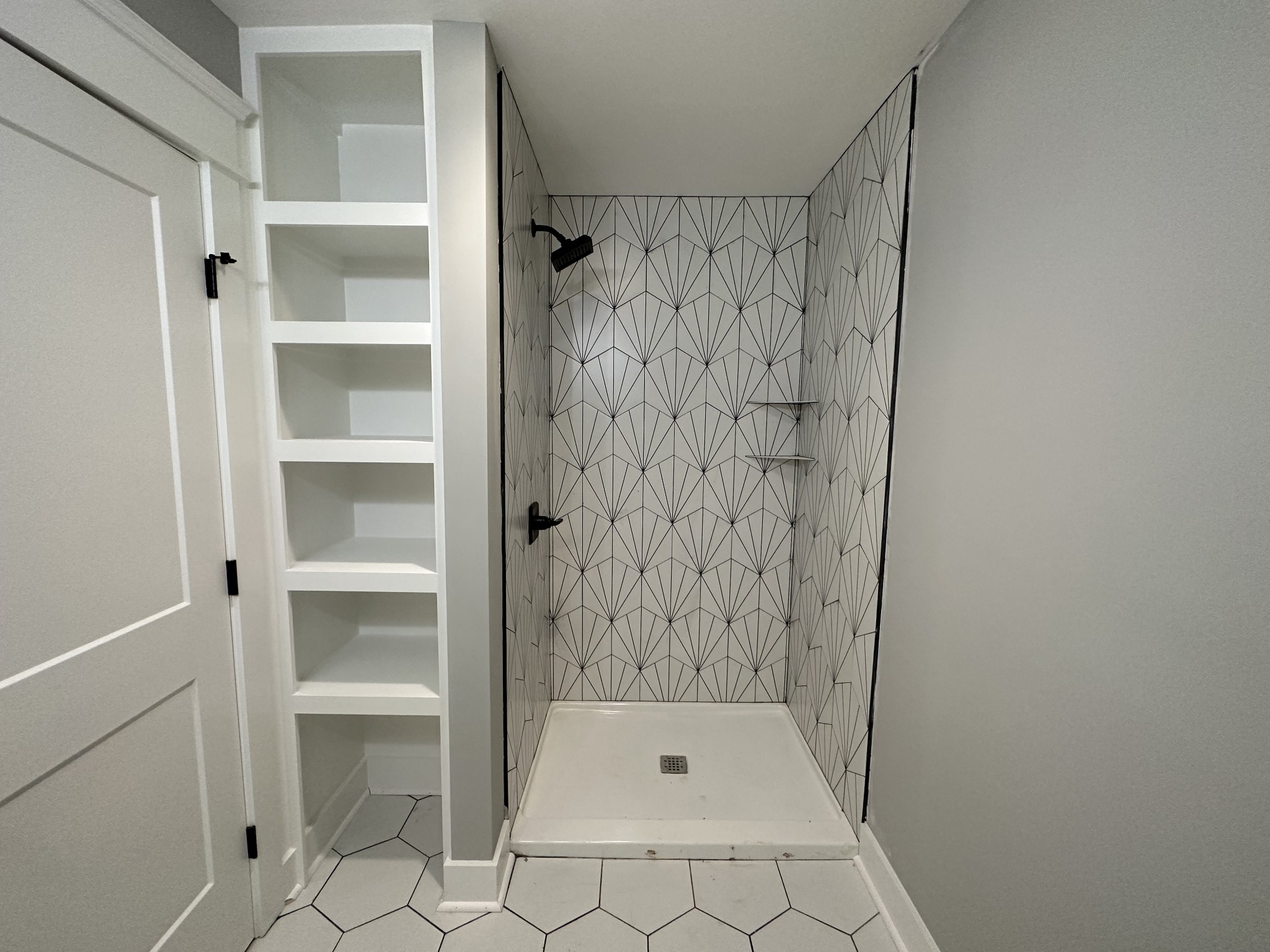285 Aplin Branch Road Cottontown, TN 37048 - Photo 54 of 70 a bathroom with a shower and a sink