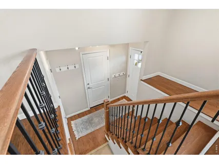 a view of a hallway and stairs