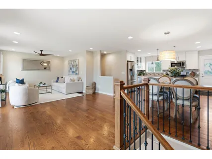 a view of a living room and kitchen